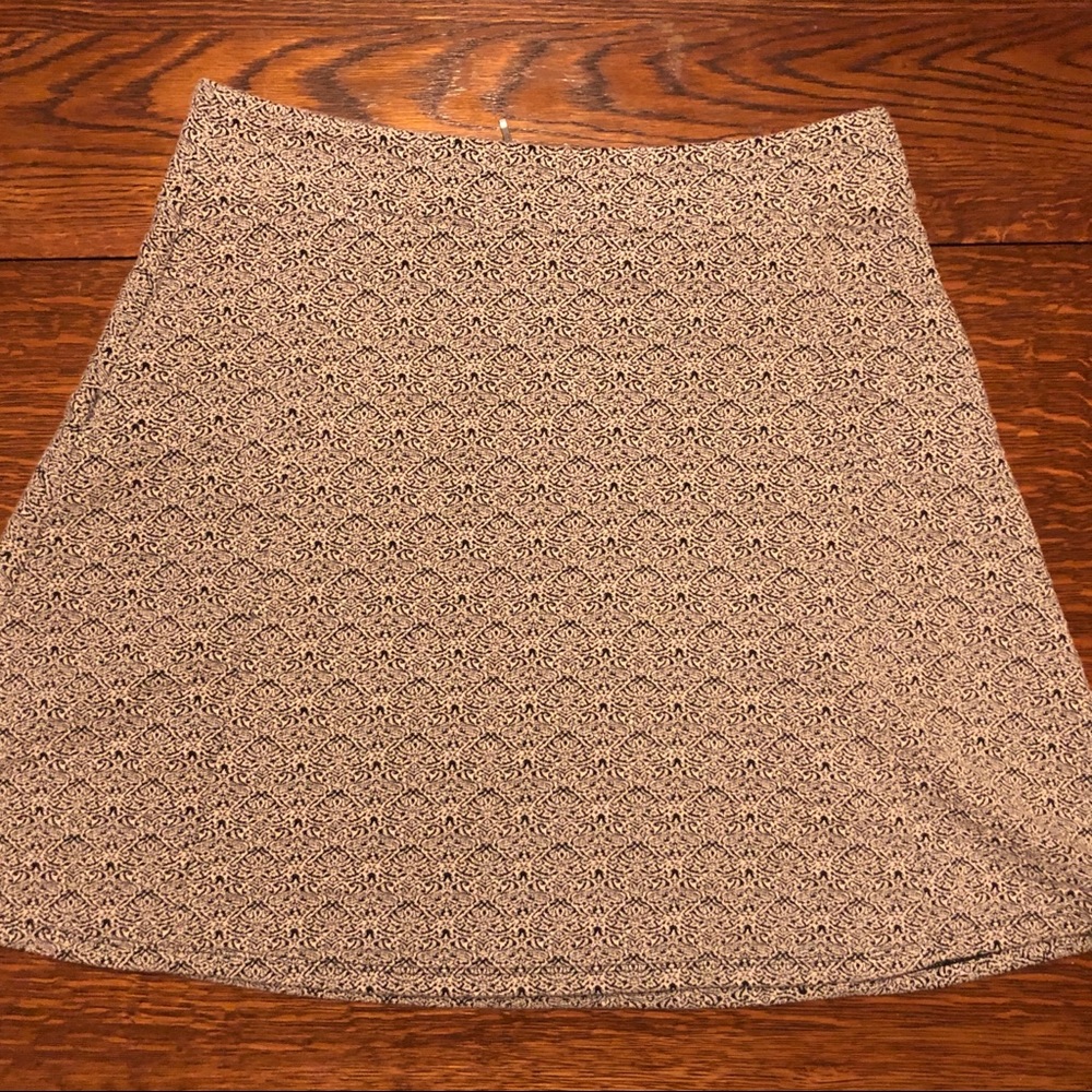 Black and white A-line skirt.